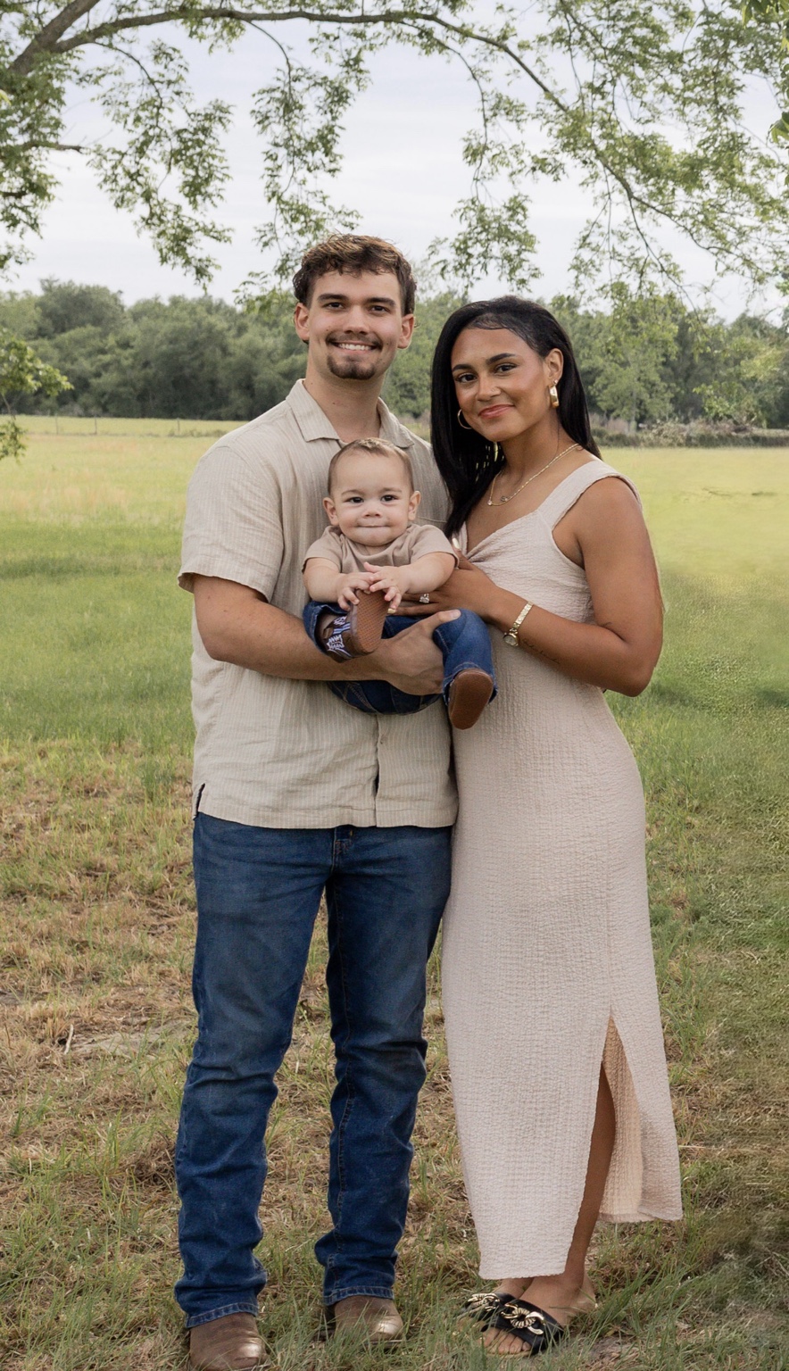 Philip Robinson with his wife and son